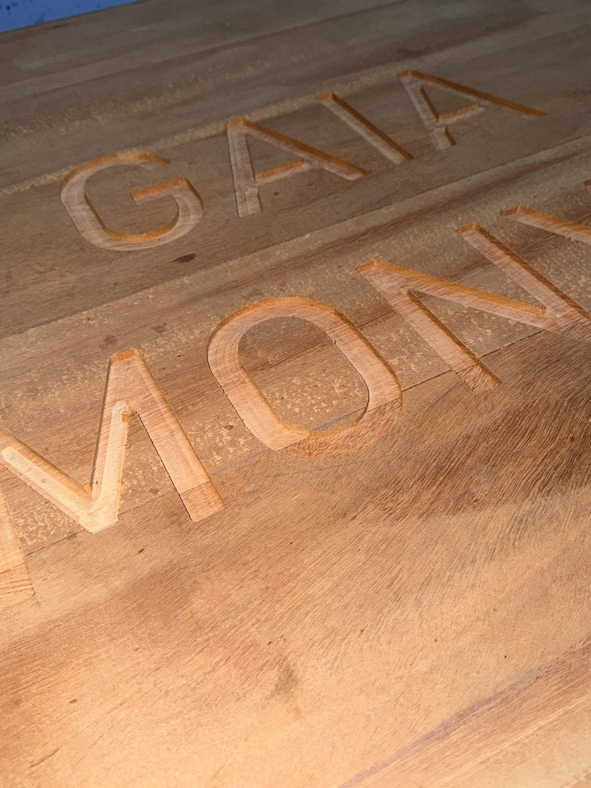 CNC-routed wooden signage lettering at Karunia Metal Laser